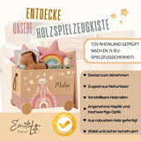 Personalisierte Spielzeugkiste aus Holz mit Namen – Hase auf Regenbogen