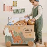 Personalisierte Spielzeugkiste Dino aus Holz mit Namen des Kindes auf der Vorderseite